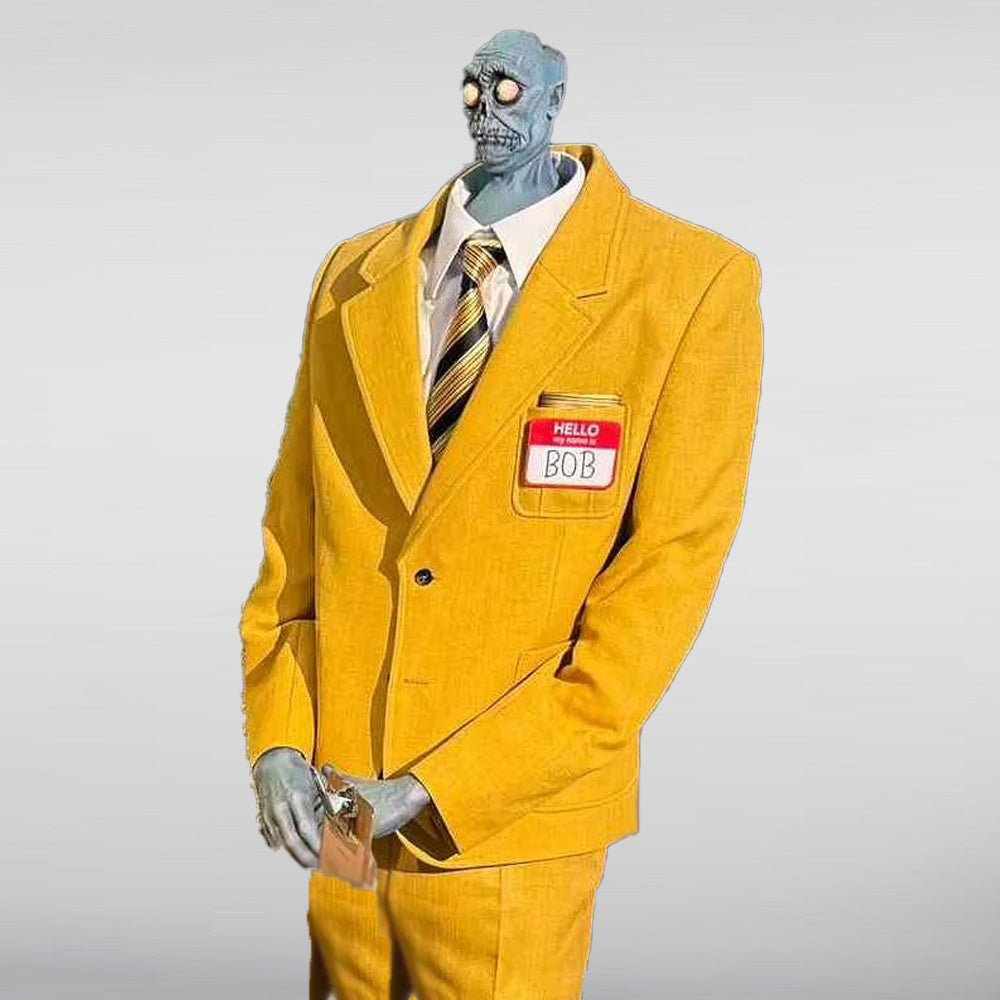 Front view of Beetlejuice Shrunken Head Bob Yellow Suit costume with name tag, tie, and black shoes.