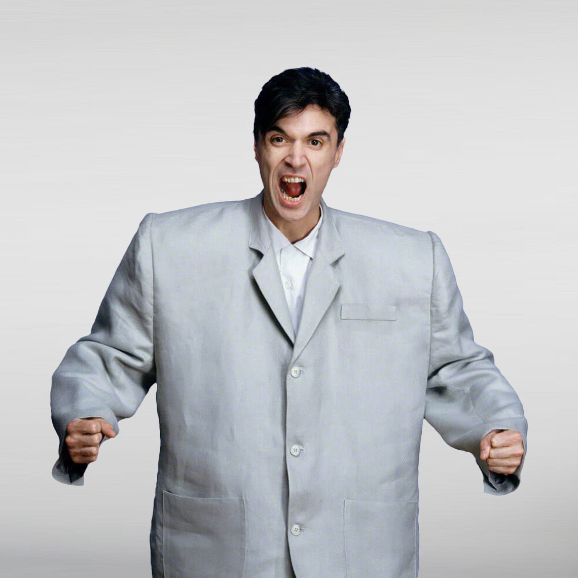 David Byrne wearing his iconic oversized gray suit, ideal for a David Byrne big suit costume or Talking Heads cosplay